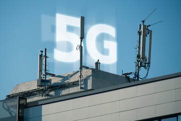 5G network transmitters on the roof of a skyscraper