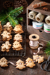 Rustic gingerbread cookie chain as decoration for Christmas