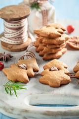 Fototapeta na wymiar Tasty gingerbread cookie chain as Christmas ornaments