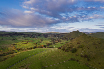 Naklejka premium Stunning aerial drone landscape image of Peak District countryside at sunrise on Autumn Fall morning