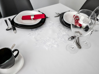 Table for two prepared for meal in restaurant