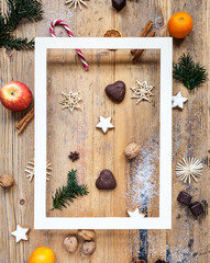 copy space, blank paper frame on wooden table with christmas decoration, winter, background