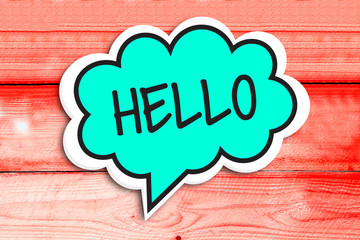 Hello Speech Bubble Isolated On wooden Background