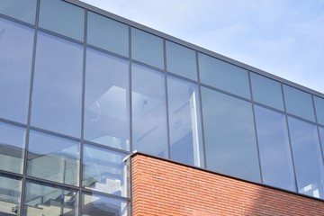 Modern office building detail, glass surface