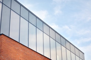 Fototapeta na wymiar Modern office building detail, glass surface
