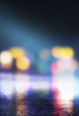 Empty abstract background. Reflection of blurry city lights on asphalt, smoke, bokeh. Neon...