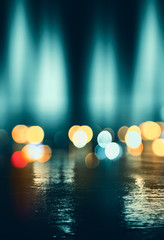 Empty abstract background. Reflection of blurry city lights on asphalt, smoke, bokeh. Neon...
