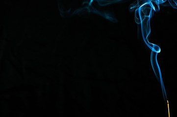 Smoke on a black background. Abstraction.