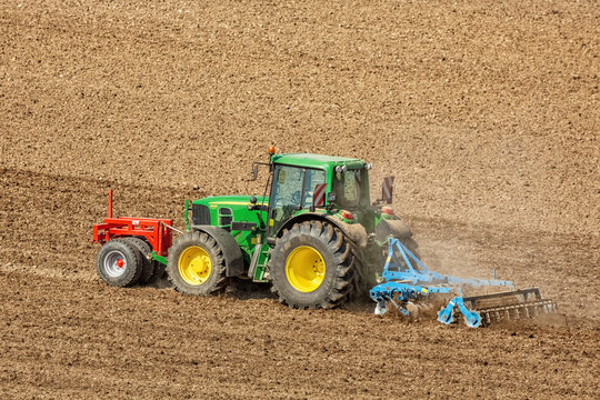 Soil Cultivation, John Deer (Tractor), Lemken (Disc Harrow), SV/Moschner (Land Roller), BKT (Tires), Germany, Lower Saxony, May 2016, Editorial