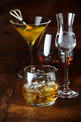 Whisky on the rocks, martini, cognac and liqueur