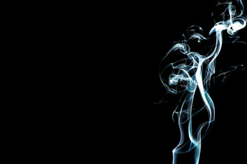 Smoke on a black background. Abstraction.