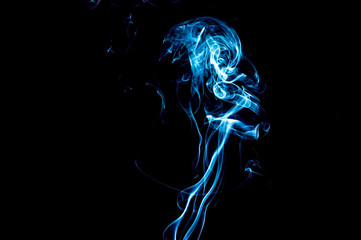 Smoke on a black background. Abstraction.