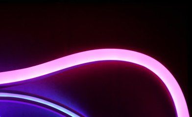 Abstract neon lights in the dark. Pink and blue lights
