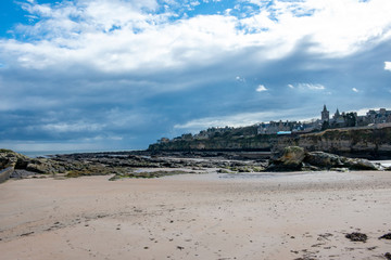 Dark clouds over the beach at St Andrews in Scotland
