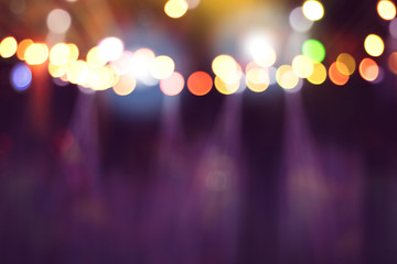 blurred lights on stage, abstract image of concert lighting, background party blur celebration concept.