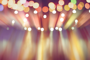 blurred lights on stage, abstract image of colourful lighting, background party blur celebration...