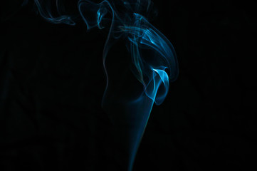 Smoke on a black background. Abstraction.