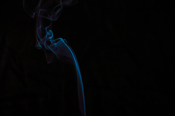 Smoke on a black background. Abstraction.