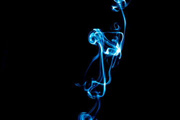 Smoke on a black background. Abstraction.