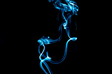 Smoke on a black background. Abstraction.