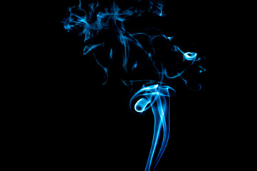 Smoke on a black background. Abstraction.