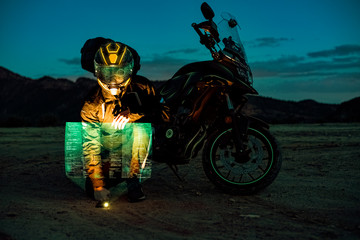 traveller on a motorbike with futuristic aesthetics and neon lights