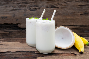 Banana coconut fresh cocktail vanilla smoothies juice and White banana fruit beverage healthy the...