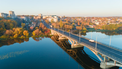 Obraz premium drone with a camera, a beautiful summer river from a height. Drone Aerial View of city and River