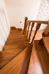 Obraz na płótnie Canvas Contemporary brown wooden stairs in the house