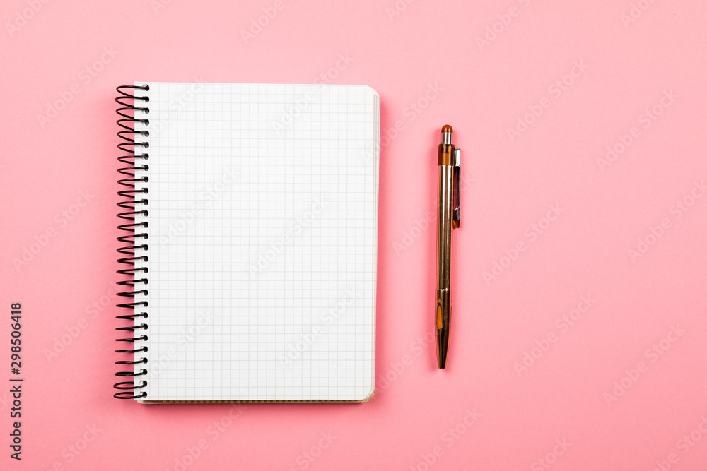Poster the white open notepad isolated on the pink background