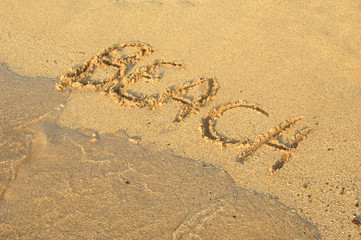 Fototapeta na wymiar Beach Writing in the Sand
