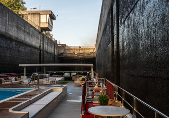 Deck of river cruise boat inside the lock at the Crestuma Lever dam on River Douro in Portugal