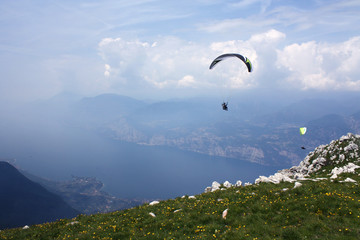 Paraglider over Lake Garda, Italy, on a summer day