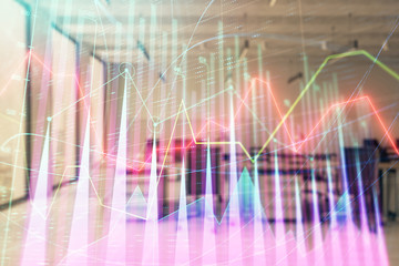 Stock market chart with trading desk bank office interior on background. Double exposure. Concept of financial analysis