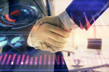 Double exposure of business theme drawing on office background with two businessmen handshake. Concept business