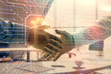 Double exposure of blockchain theme drawing on office background with two businessmen handshake. Concept of crypto economy