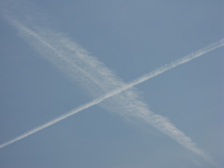 Fototapeta na wymiar Traces of airplanes in the sky