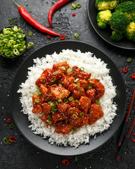 Tso's chicken with rice, green onion and broccoli