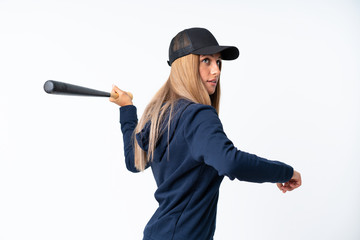 Young blonde woman playing baseball over isolated background