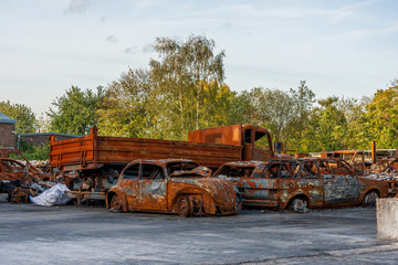 rusted burnt out car wrecks
