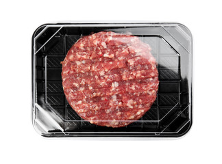 Plastic container with raw meat cutlet for burger isolated on white, top view