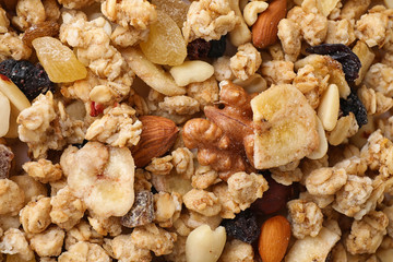 Healthy crunchy granola as background, top view