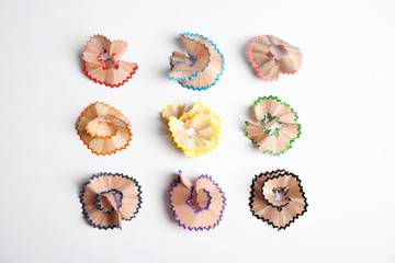 Pencil shavings on white background, top view