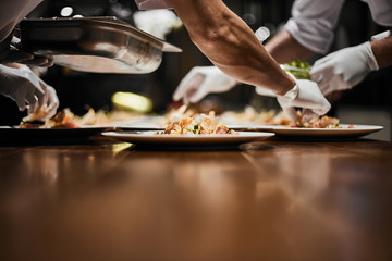 Fototapeta premium Chef preparing dish..
