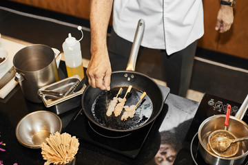 Chef cooking in a kitchen..
