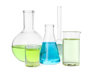 Glassware with color liquids for laboratory analysis isolated on white