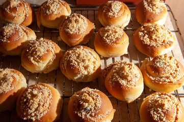  buns with cherries on the table