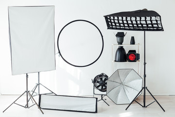 Photo studio equipment accessories photographer flashes on white background