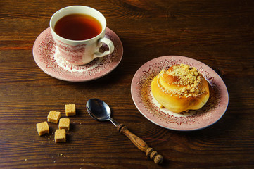  morning tea with a bun on a wooden table1