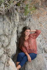 Happy woman relaxing and enjoying at the beach during travel holidays vacation outdoors at ocean or nature sea